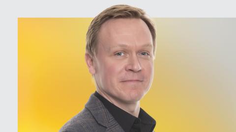 A graphic of BBC Radio Suffolk sports editor Graeme McLoughlin against a yellow background