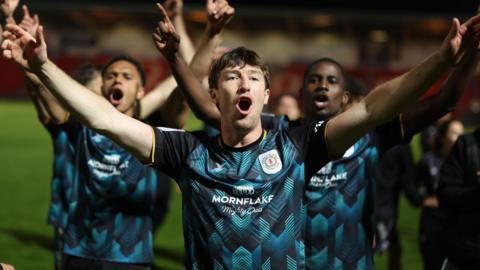 Chris Long celebrates Crewe reaching the League Two play-off final