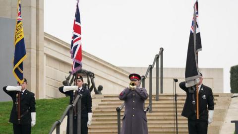 Members of the British Armed Forces during the Remembrance Sunday service at the National Memorial Arboretum