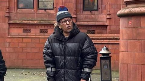 Farhat Ajaz, 61, outside Birmingham Magistrates' Court