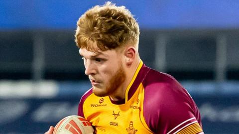 Luke Billington playing for Huddersfield Giants against Hull FC 