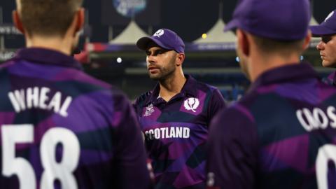 Scotland captain Kyle Coetzer talks to his team