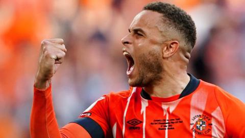 Luton Town's Carlton Morris celebrates scoring in the penalty shootout which decided the 2023 Championship play-off final