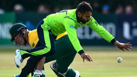 South African batsman David Miller and Simi Singh collide at Stormont