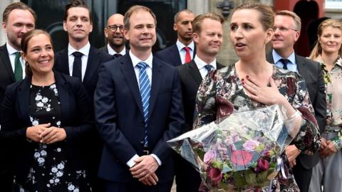 Mette Frederiksen outside the palace in Copenhagen