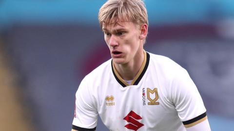 Lasse Sorensen in action for MK Dons