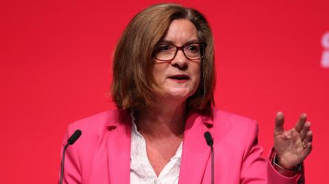 Eluned Morgan speaking at Welsh Labour conference in Liverpoool.