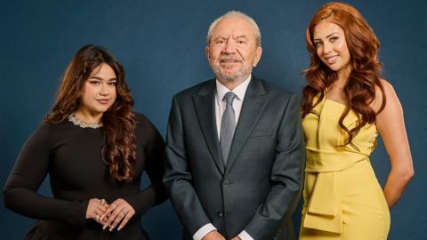 Two candidates from The Apprentice and Lord Sugar looking at the camera