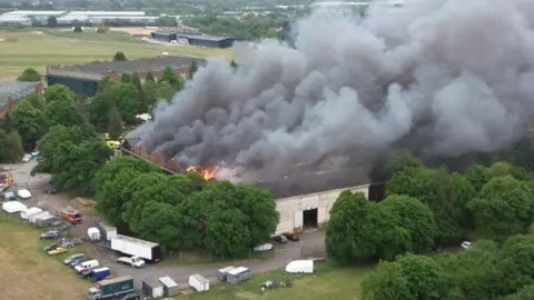 Large plumes of smoke were filmed coming from one of the Bicester Motion buildings
