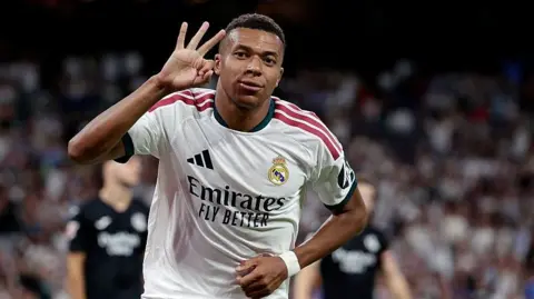 Kylian Mbappe celebrates