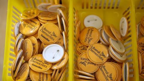 Lib Dem badges on sale at the conference