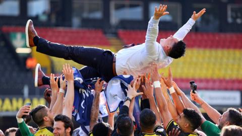 Watford players celebrate promotion with boss Xisco Munoz