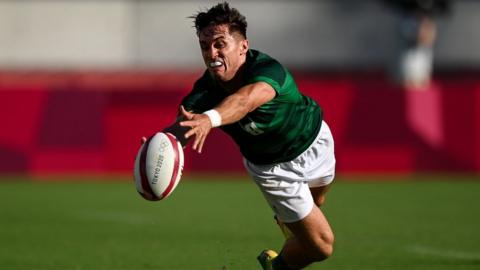 Greg O'Shea attempts to catch a ball at the Olympics