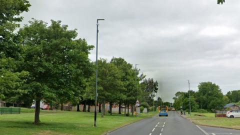 A CCTV camera on a pole with a burnt base