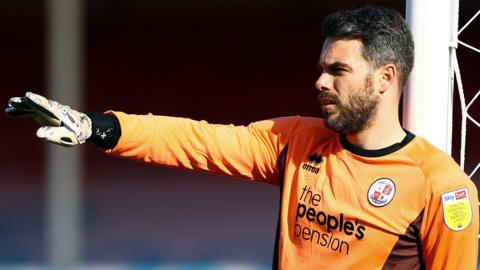 Gillingham have signed goalkeeper Glenn Morris from Crawley Town on six-month-loan