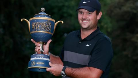 Patrick Reed with the WGC-Mexico Championship trophy