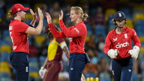 Charlie Dean celebrates a wicket