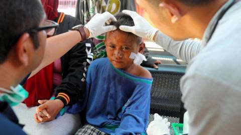 A child receives treatment