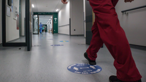 Nurse walking in a hospital corridor