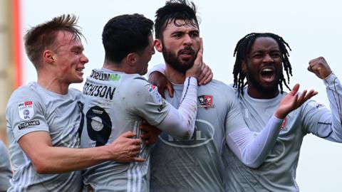 Exeter City celebrate scoring