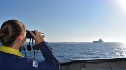 Greek and French vessels sail in formation during a joint military exercise in the Mediterranean Sea