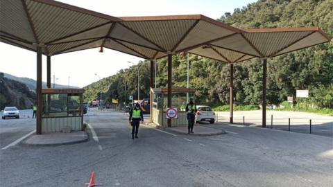 Spanish police at the check point in La Jonquera, which is on the border with France