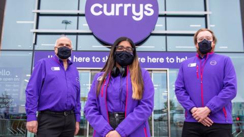 Currys branch with staff