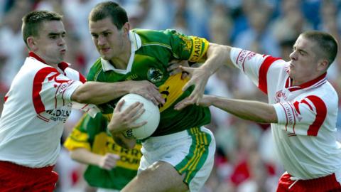 Kerry's Eoin Brosnan attempts to get past Tyrone's Ryan McMenamin and Ciaran Gourley in the 2003 All-Ireland semi-final