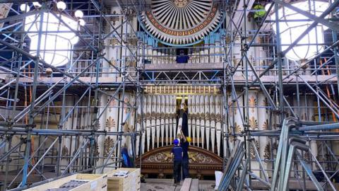 Specialists get to work on refurbishing the organ in Leeds Town Hall