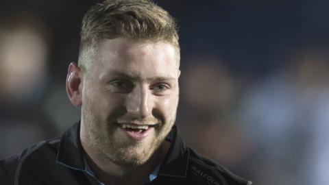 Finn Russell grins after helping Glasgow to beat Racing 92 for a second time in December