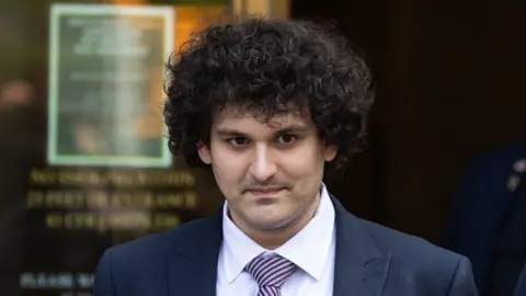 Sam Bankman-Fried, co-founder of FTX Cryptocurrency Derivatives Exchange, leaves court in New York, US, on Wednesday, July 26, 2023