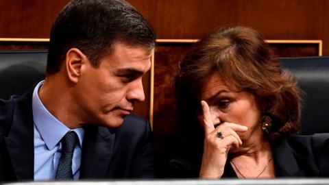 Spanish Prime Minister Pedro Sanchez Deputy Prime Minister and Deputy Prime Minister and minister of equality Carmen Calvo attend a debate on the government"s 2019 budget during a parliament session in Madrid on February 13, 2019