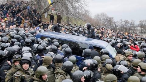 Mr Saakashvili's was detained in a car that got swamped by supporters and police