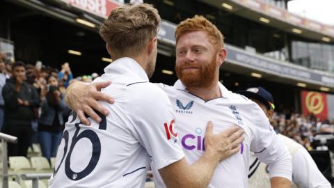 Jonny Bairstow and Joe Root hug after England's win over England at Edgbaston