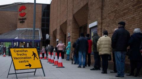 A queue at a vaccination centre in Newport