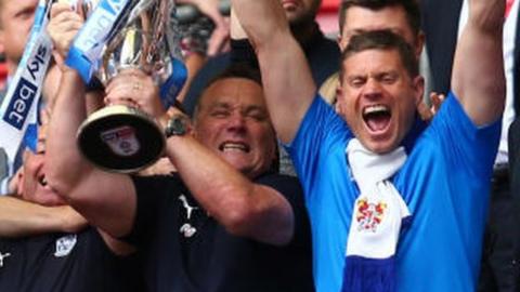 Micky Mellon took Tranmere to League One promotion a year ago with Steve Banks, right, part of his coaching staff