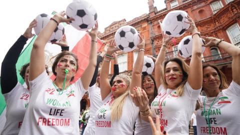Iranian women protesting World Cup