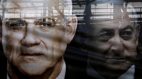 File photo showing Blue and White election poster featuring Benny Gantz (L) and Benjamin Netanyahu (R) in Tel Aviv, Israel (17 February 2020)