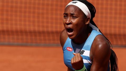 Coco Gauff celebrates winning in the French Open first round
