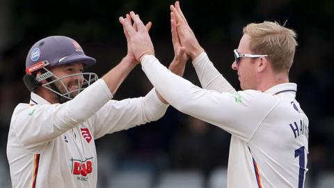 Simon Harmer takes a wicket for Essex
