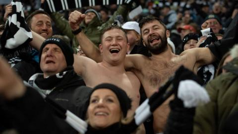 Newcastle United fans celebrate following the Carabao Cup Semi Final 2nd Leg match between Newcastle United and Southampton at St James' Park on January 31, 2023