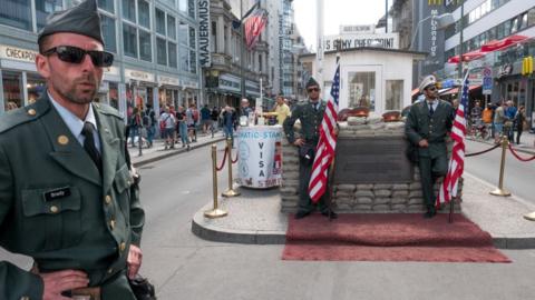 Performers posing as US soldiers at Checkpoint Charlie - 2018 photo