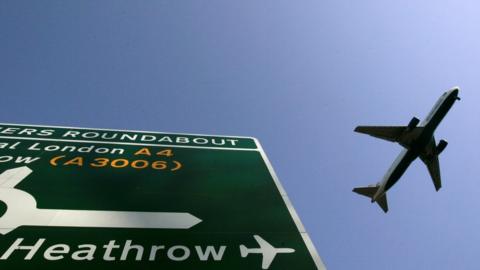 A British Airways passenger plane prepares to land at Terminal 5 at Heathrow Airport in London