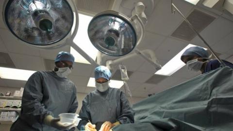 Surgeons in a theatre