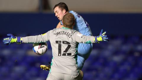 Alex Smithies saves from Jordan Shipley