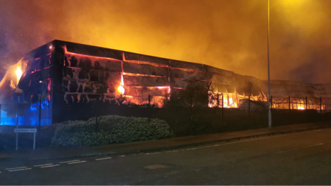 The Abbey Upholsterers factory on fire