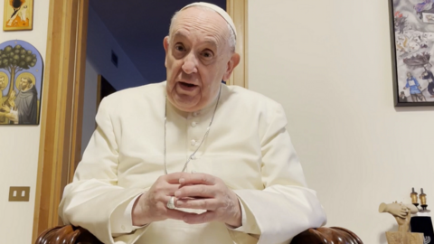 Pope Francis speaking on a recorded video