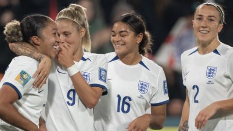 England players celebrate against China