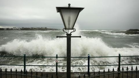 Waves crash at Trearddur Bay