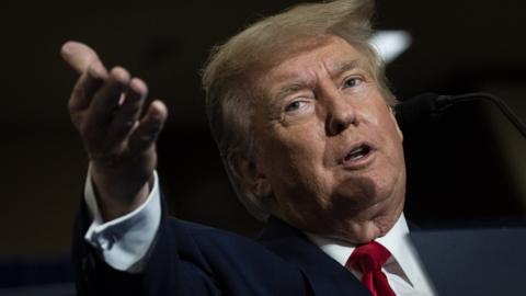 Former President Donald Trump speaks during the America First Agenda Summi in Washington, DC